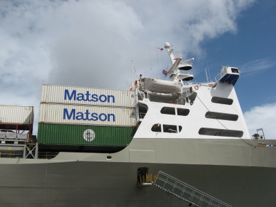 Picture of a green container for recyclables aboard a Matson vessel.