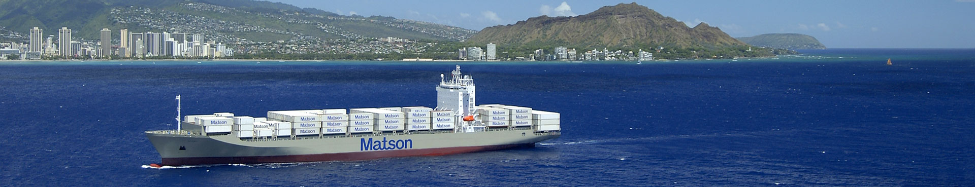 Matson containership arriving Honolulu, Hawaii with containers.